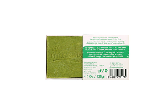 Green aloe vera natural soap bar with Hyllarima branding on a white background