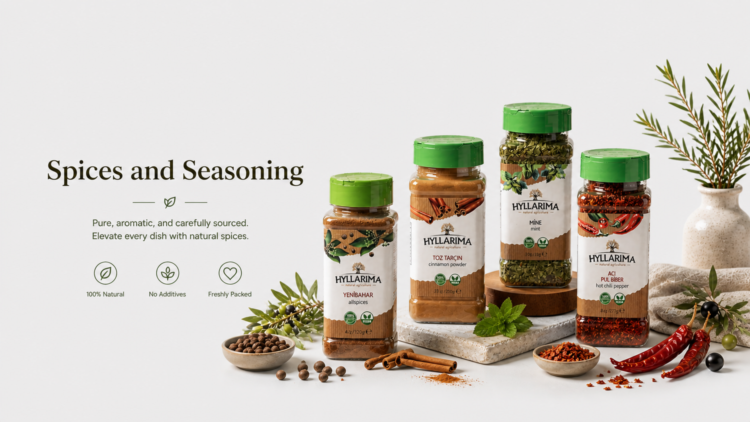 Hyllarima spices and seasoning bottles with herbs and spices on a light background