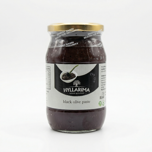 Jar of Hyllarima black olive paste on a white background