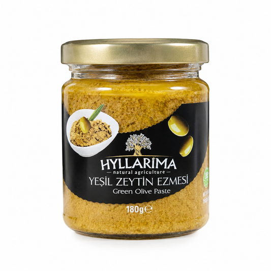 A glass jar of Hyllarima Green Olive Paste with a gold metal lid and a black label, set against a plain white background.