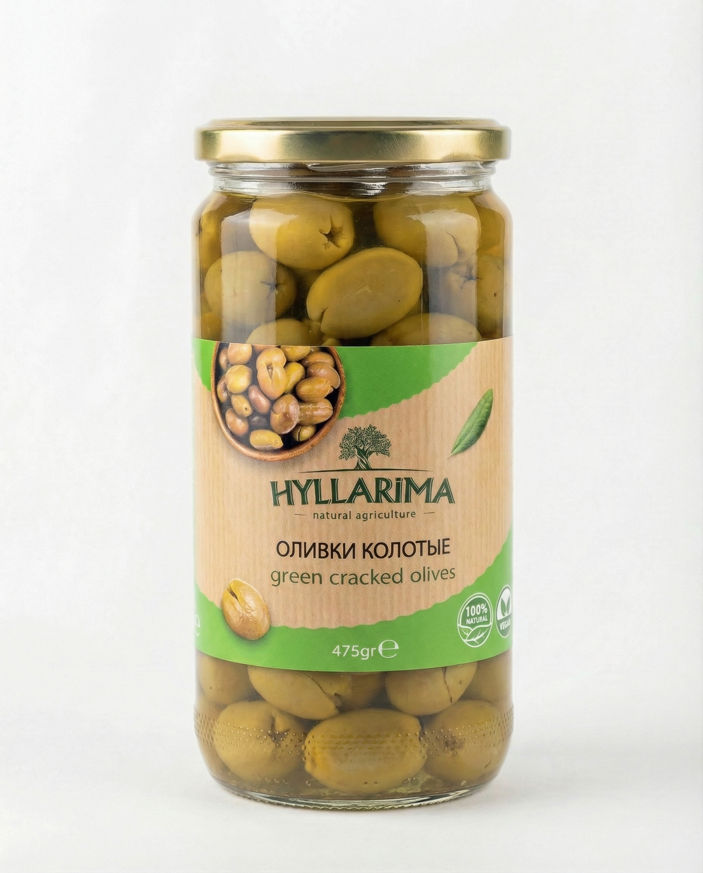 Jar of Hyllarima green cracked olives on a white background
