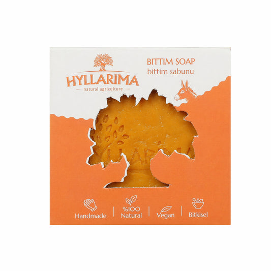 Hyllarima bittim natural soap packaging with a bar of soap inside on a white background