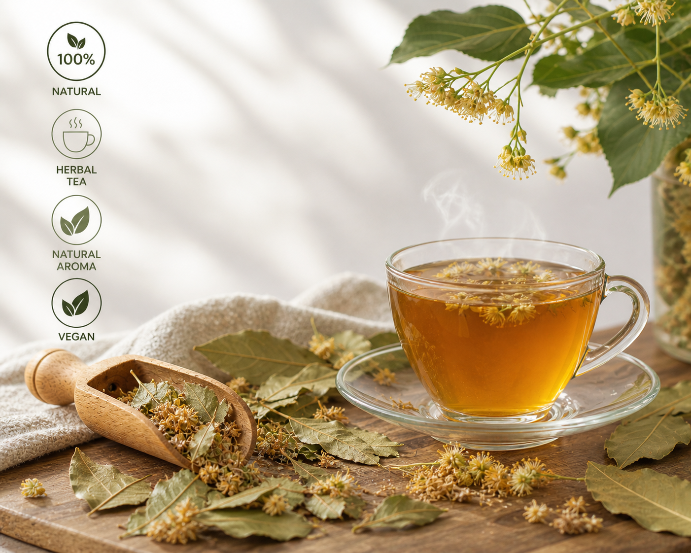 Glass cup of herbal tea with dried linden leaves on a wooden surface, featuring natural and vegan labels.