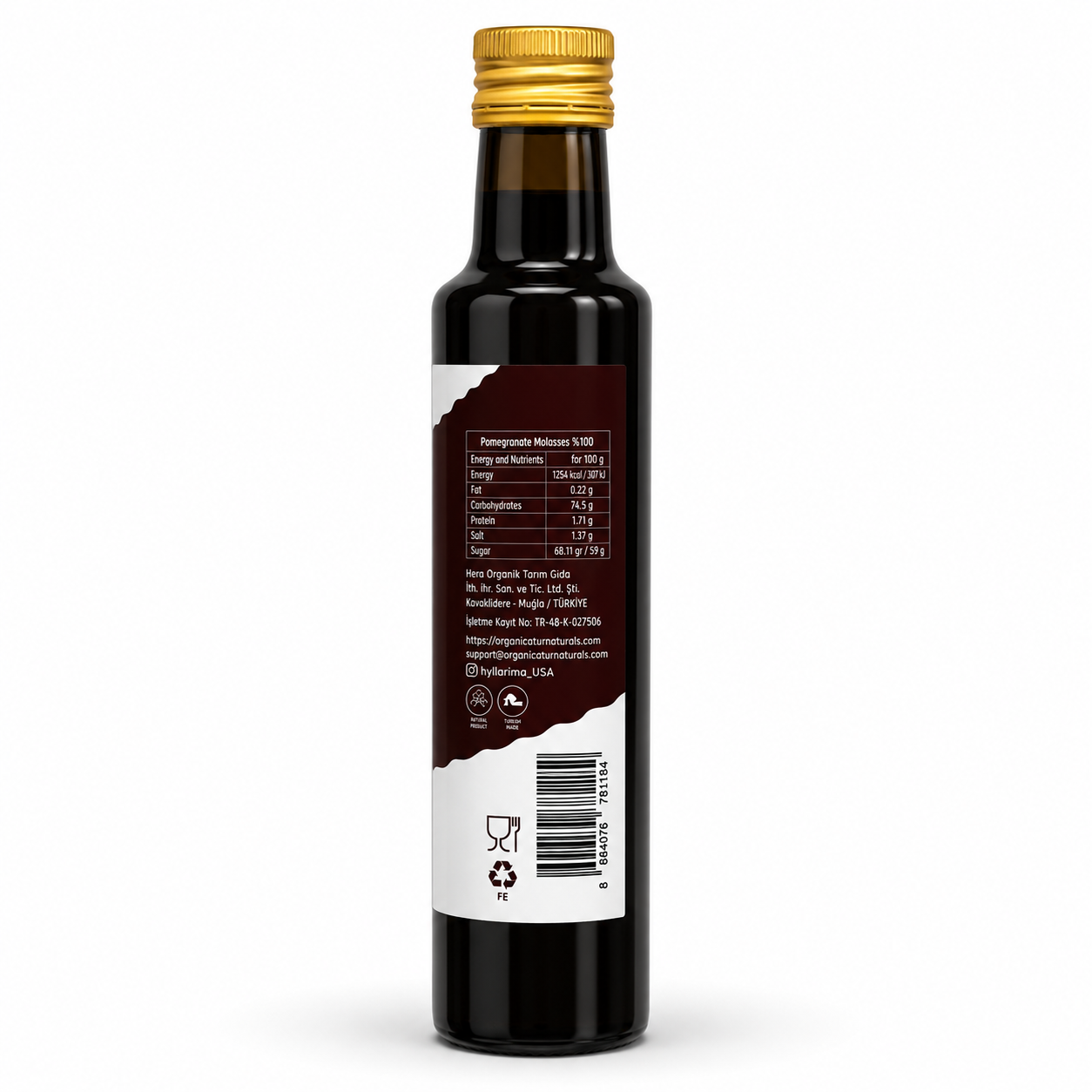 Bottle of olive oil with a gold cap on a white background